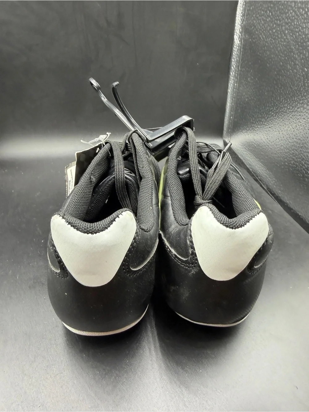 Men's Black Athletic Cleats with Yellow Accent